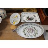A collection of Portmeirion dishes and a storage j
