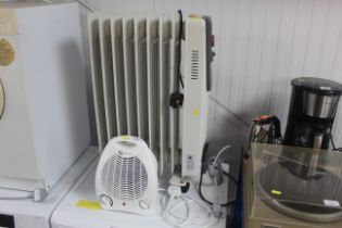 An electric oil filled radiator and fan heater