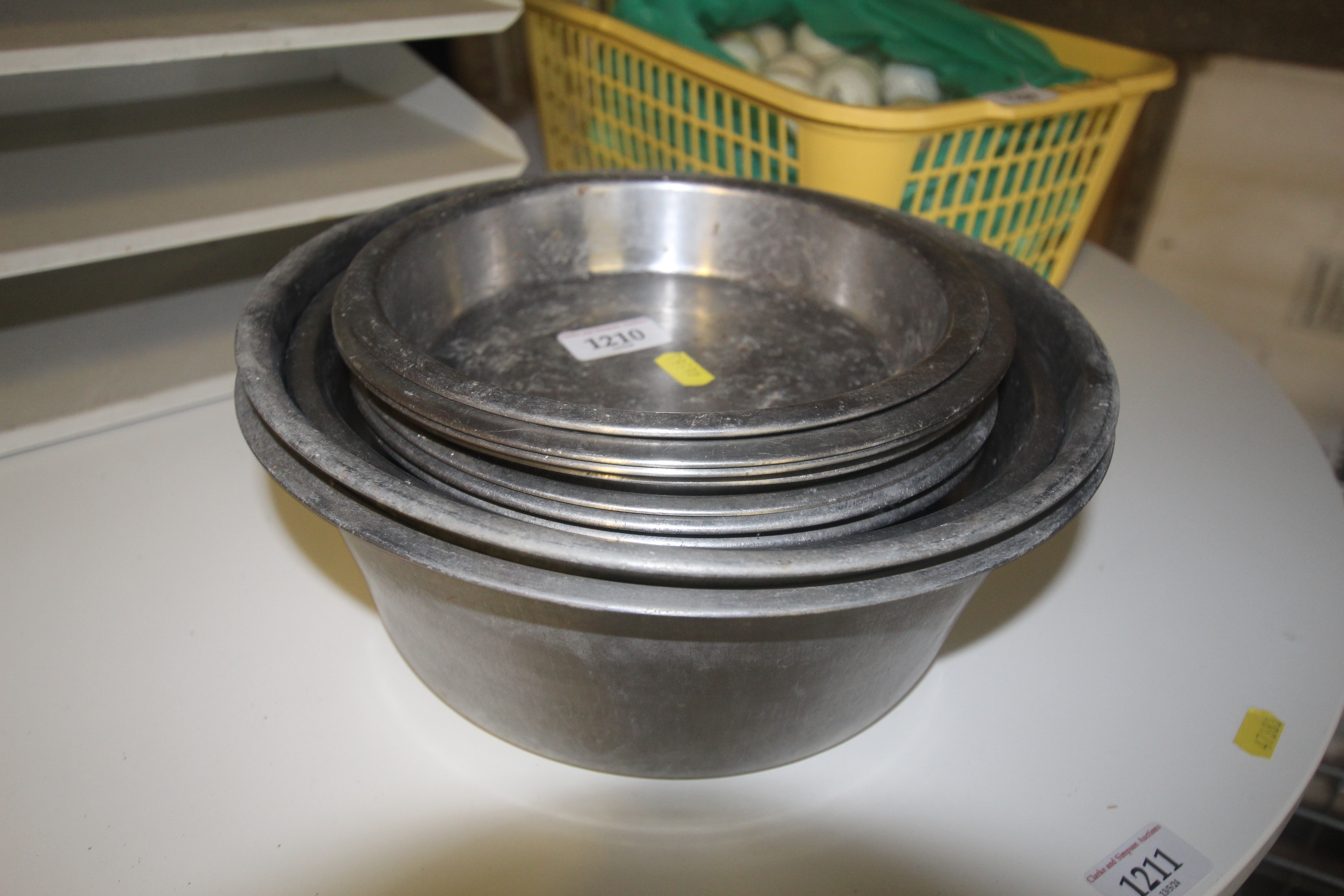 Ten stainless steel dog bowls