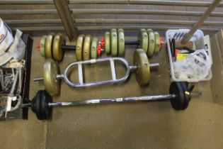 A pair of Barbells, two dumbbells and weights