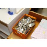 A box of various cutlery