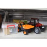 A Britain's 1/16th Case 210 tractor; a Bruder Claas baler; Bruder bale trailer, bales and a Bruder