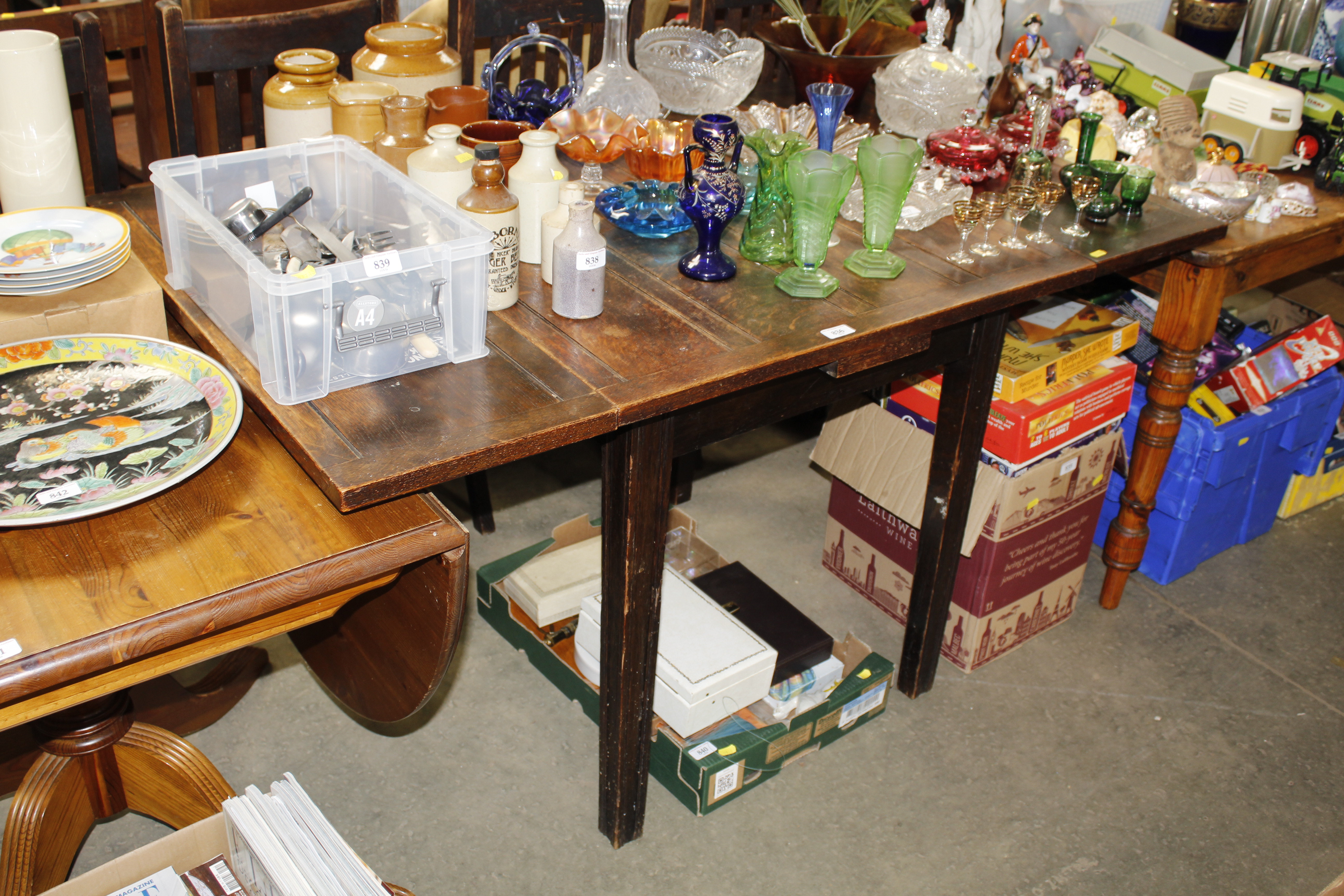 An oak draw leaf table and set of four chairs