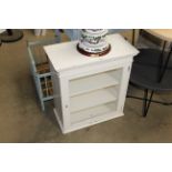 A white painted and glazed wall cabinet