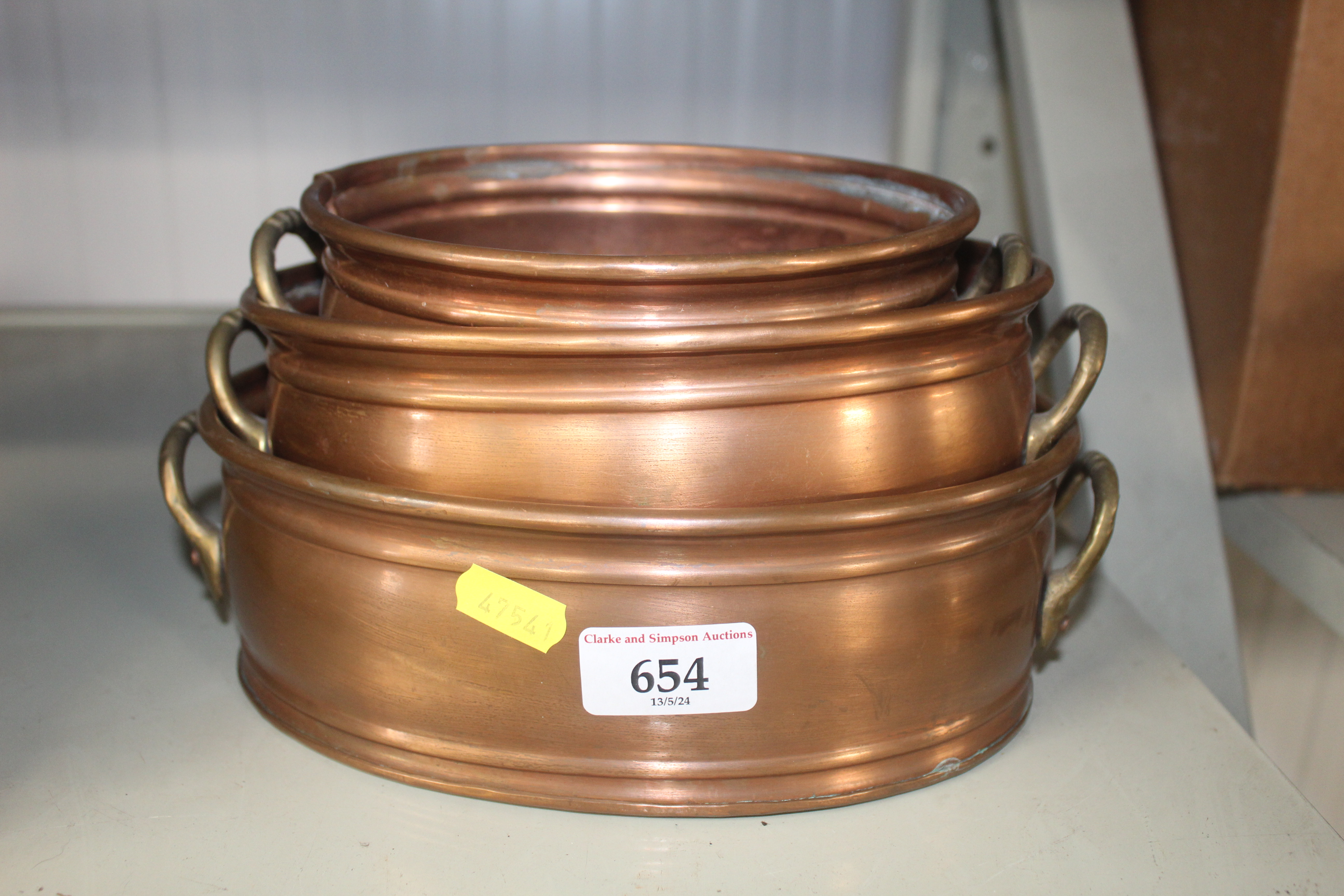 A graduated set of three copper and brass twin han - Image 2 of 2