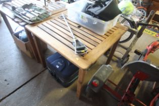 A hardwood slatted garden table