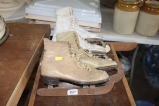 Two pairs of ice skates (sizes 5 and 6)