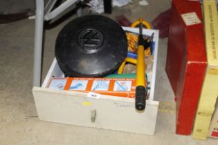 A box of car related items to include four VW hub cap