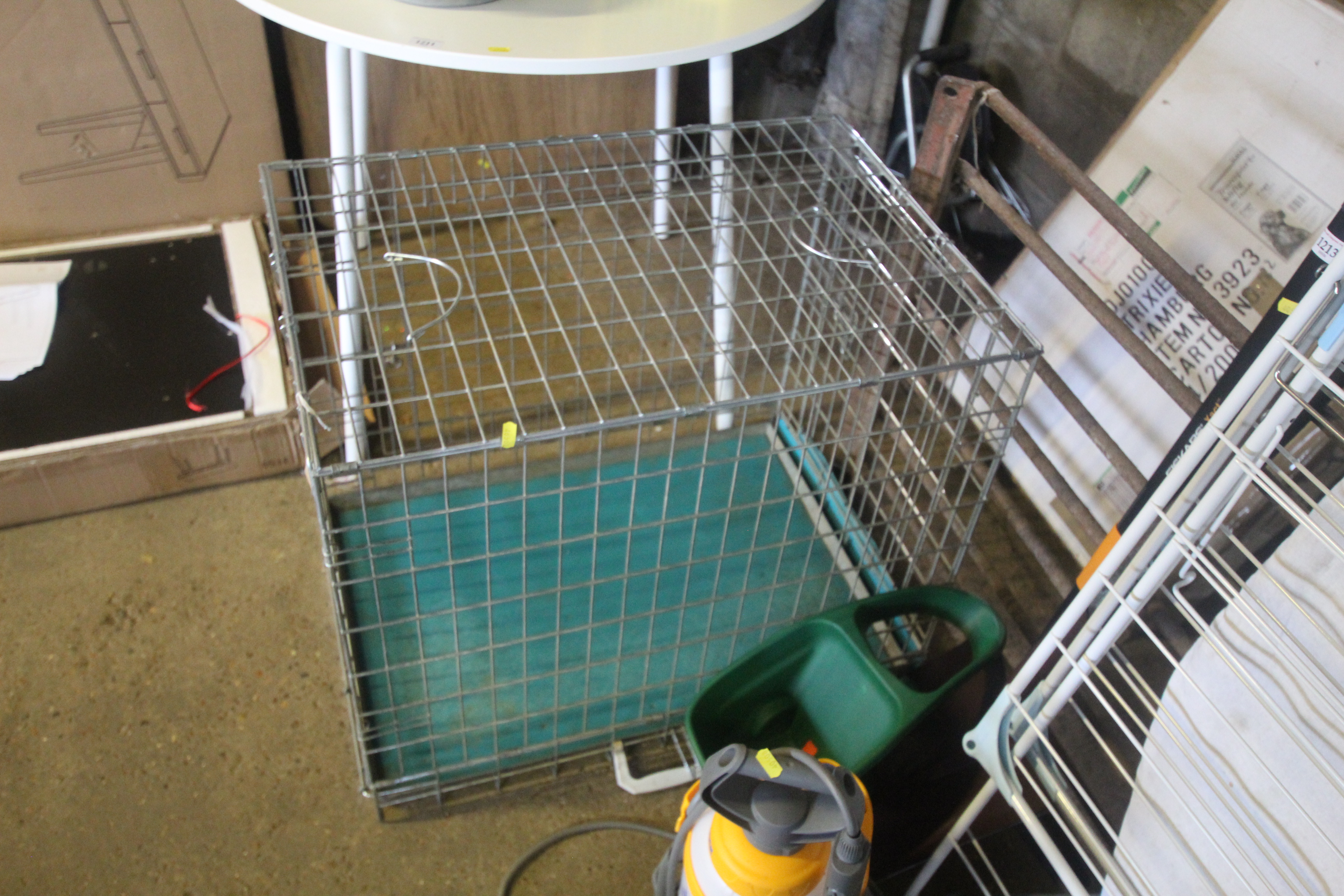 A folding metal pet cage