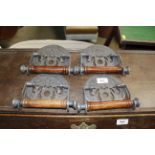 Three reproduction toilet roll holders (106)