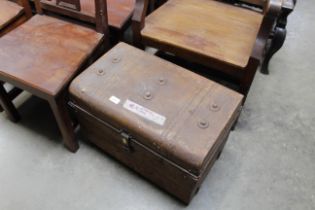 A vintage metal travelling trunk