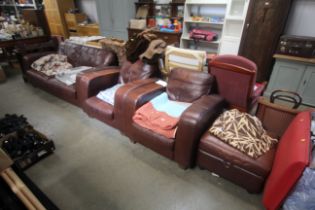 A two seater settee, two armchairs and a footstool