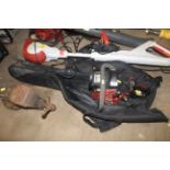 A Cobra CS420 petrol chain saw in carry case