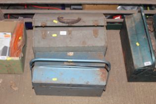 Two metal cantilever tool boxes