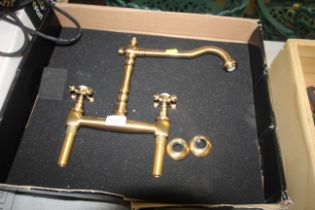 A brass effect mixer tap as new in original box