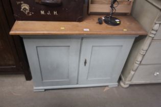 A part painted pine side cupboard