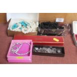 Five boxes of costume jewellery
