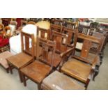 Seven Arts & Crafts type carved oak chairs, six
