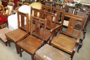 Seven Arts & Crafts type carved oak chairs, six