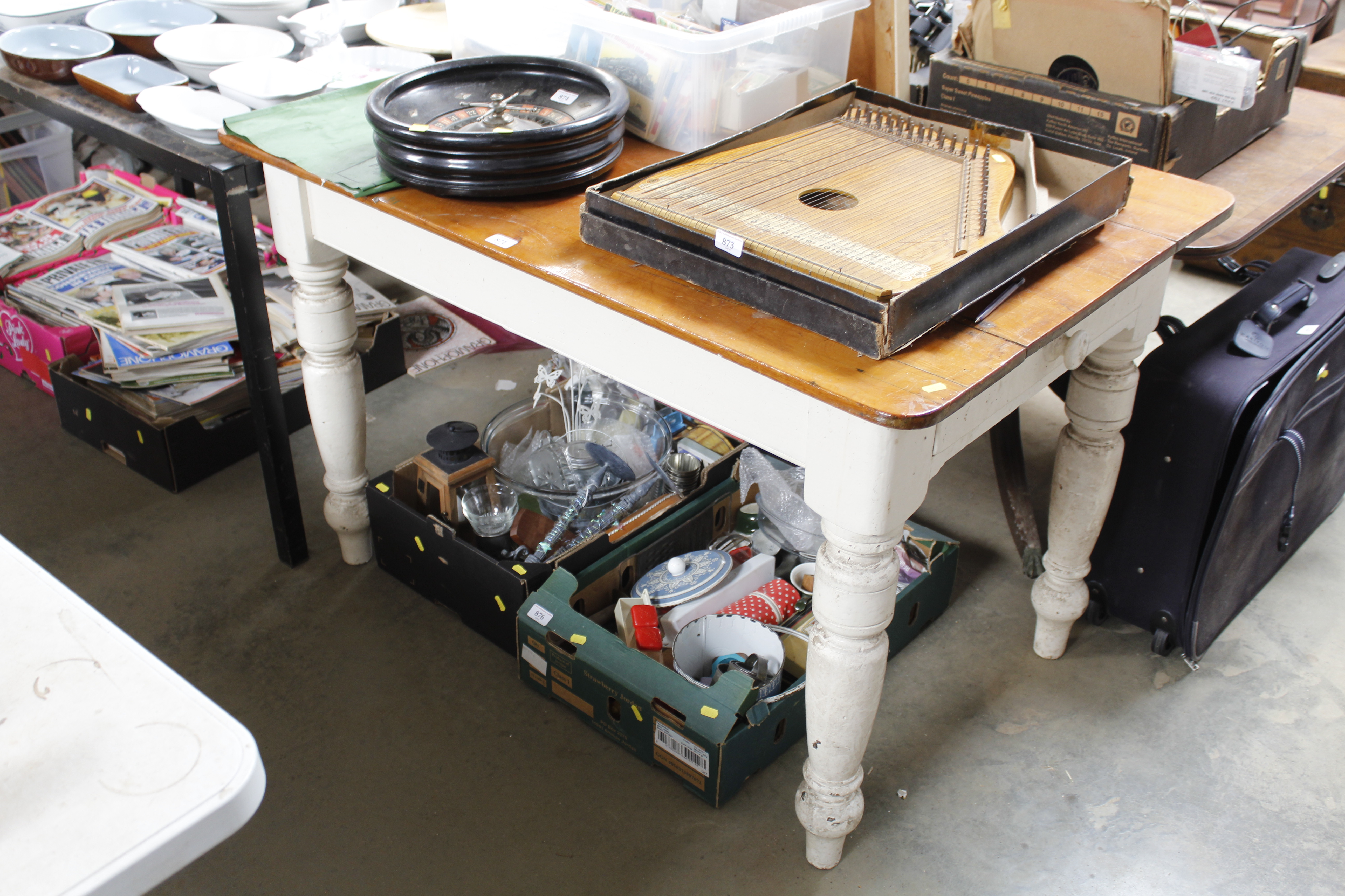 A part painted pine kitchen table fitted single dr