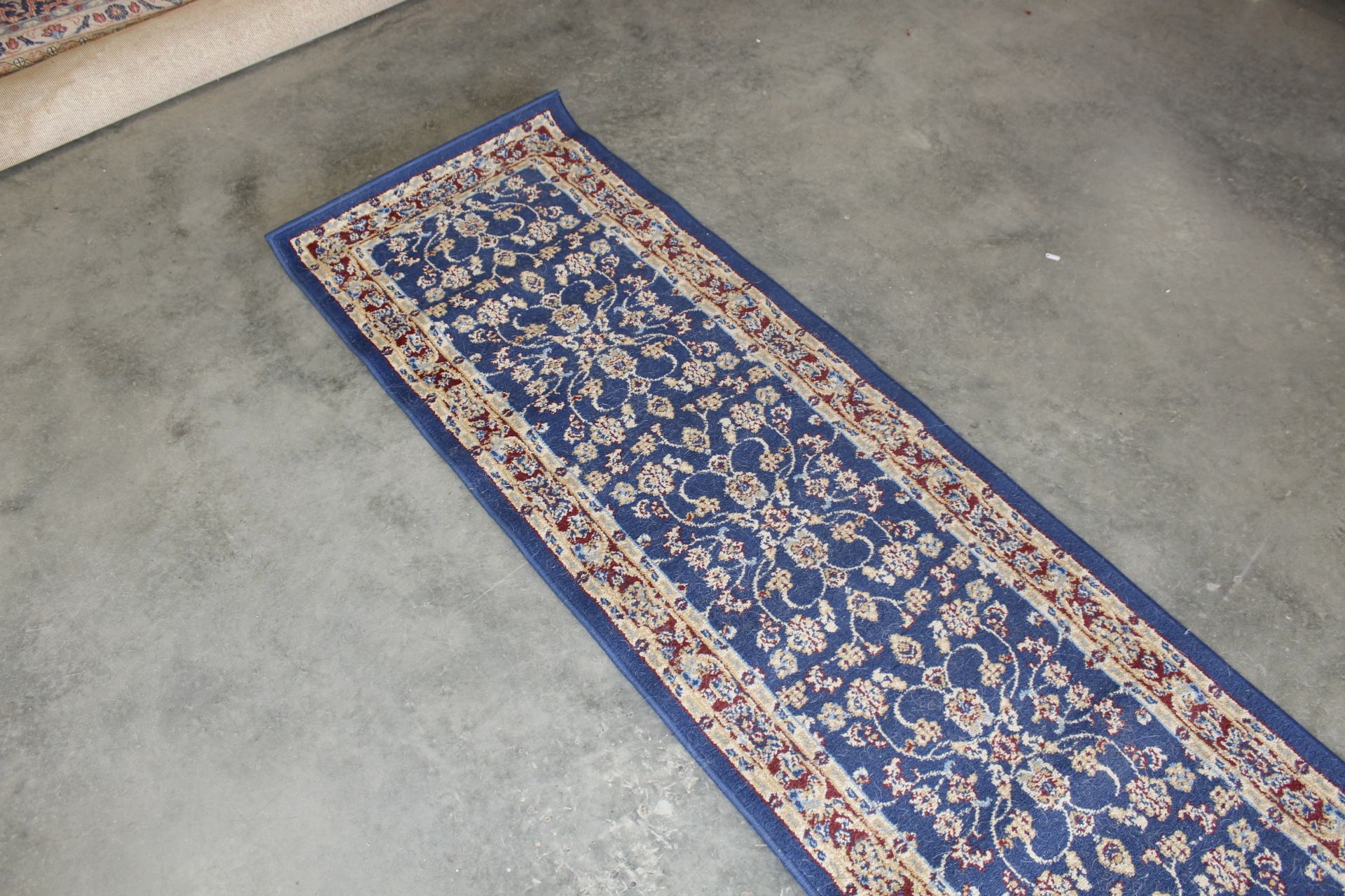 An approx. 9'11" x 2'2" blue pattern rug - Image 3 of 4