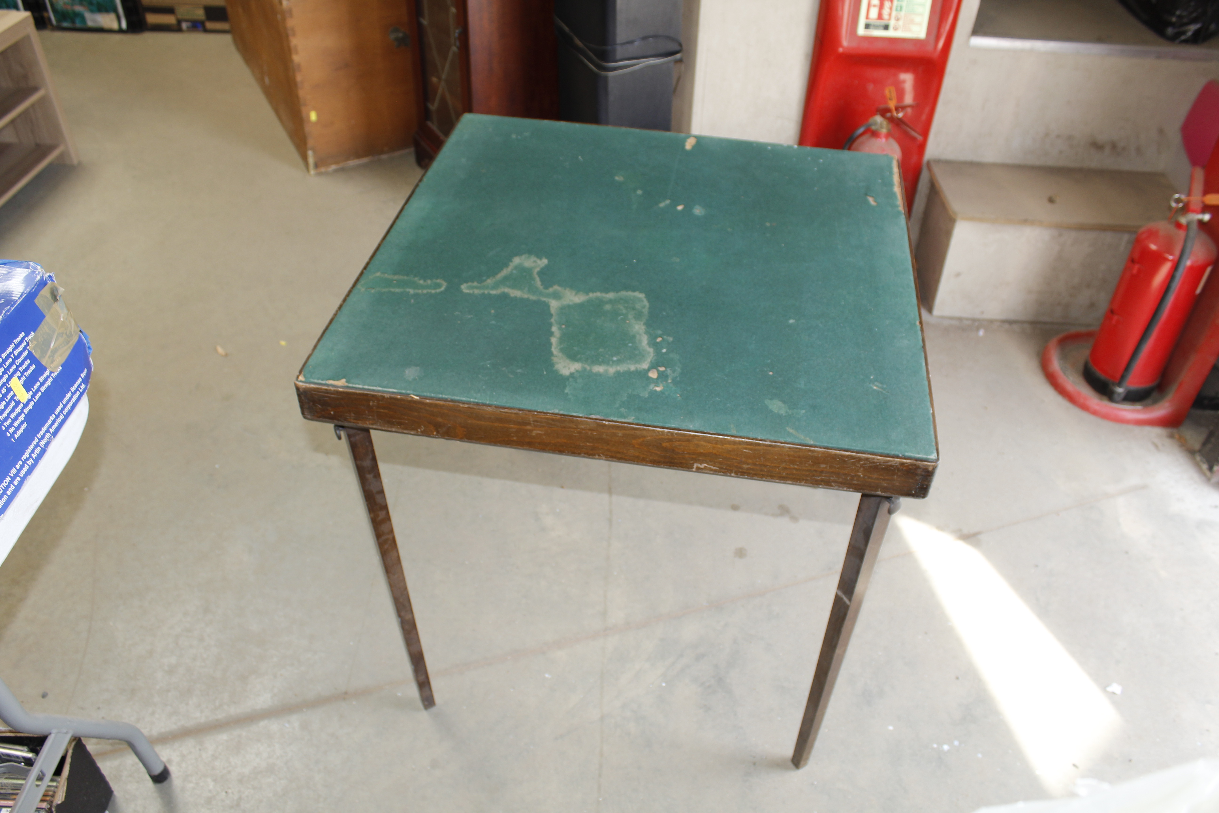 A folding card table