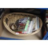 A basket containing books; a puzzle and a Royal Do
