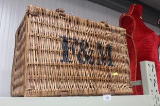 A Fortnum & Mason wicker picnic basket