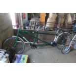 A Dawes GalaxyTwin tandem bicycle with front and r