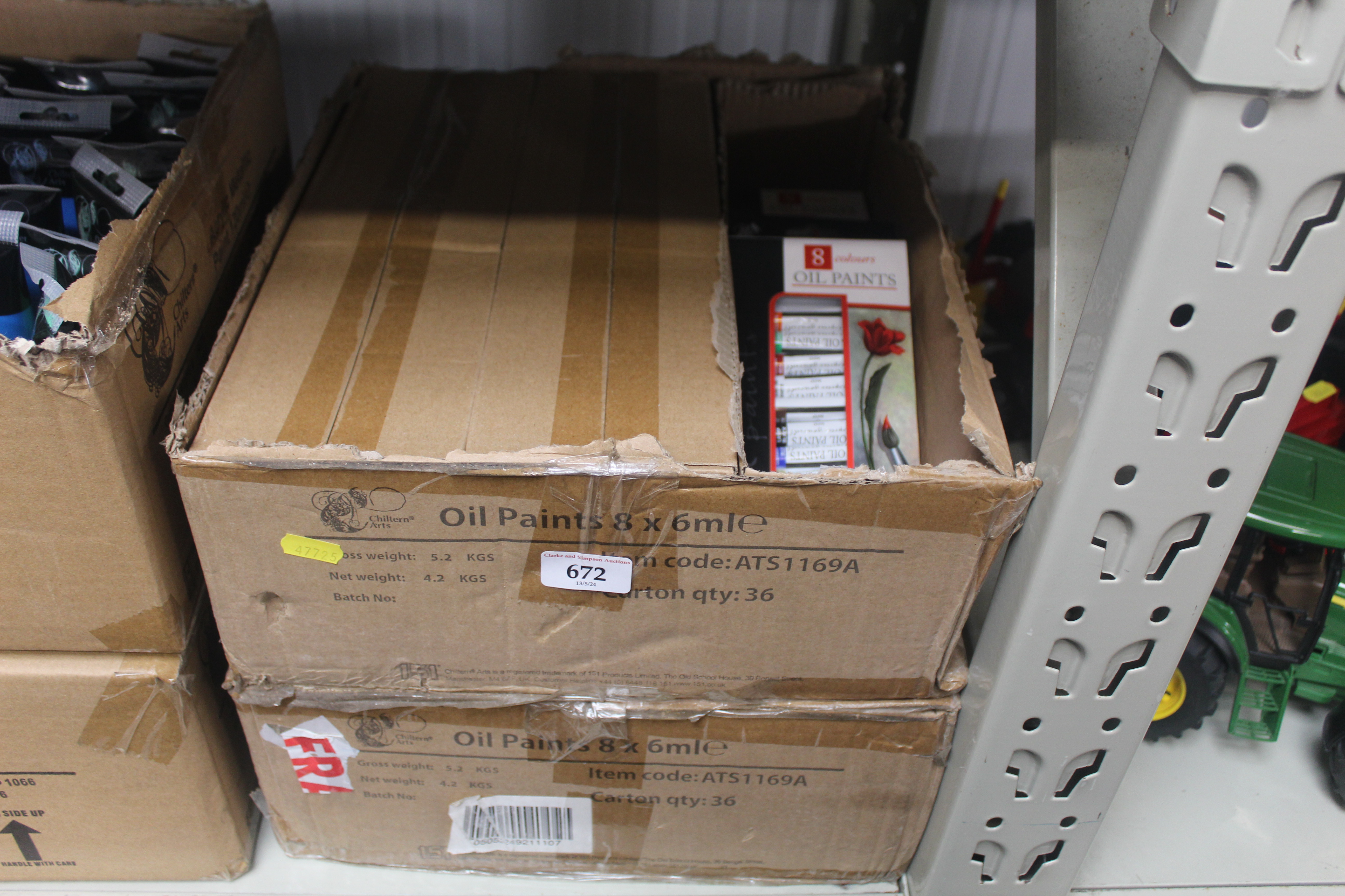 Two boxes containing a quantity of oil paints