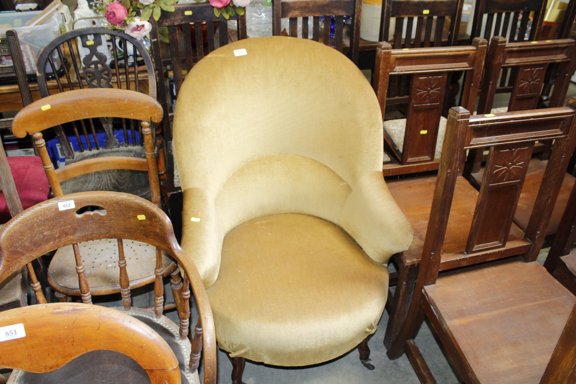 A late Victorian upholstered armchair