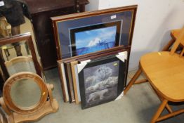 A collection of framed prints