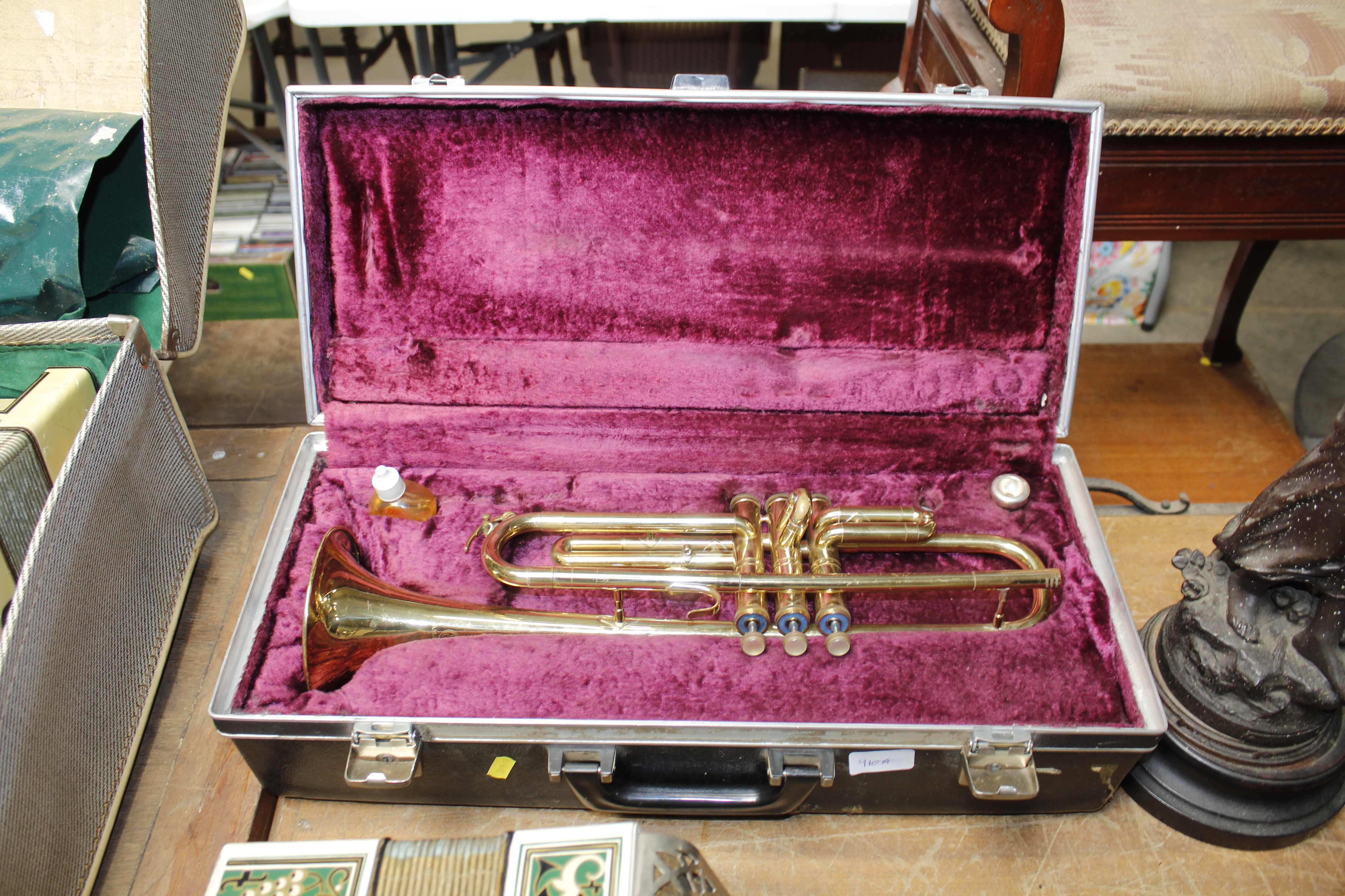 A brass trumpet in fitted case