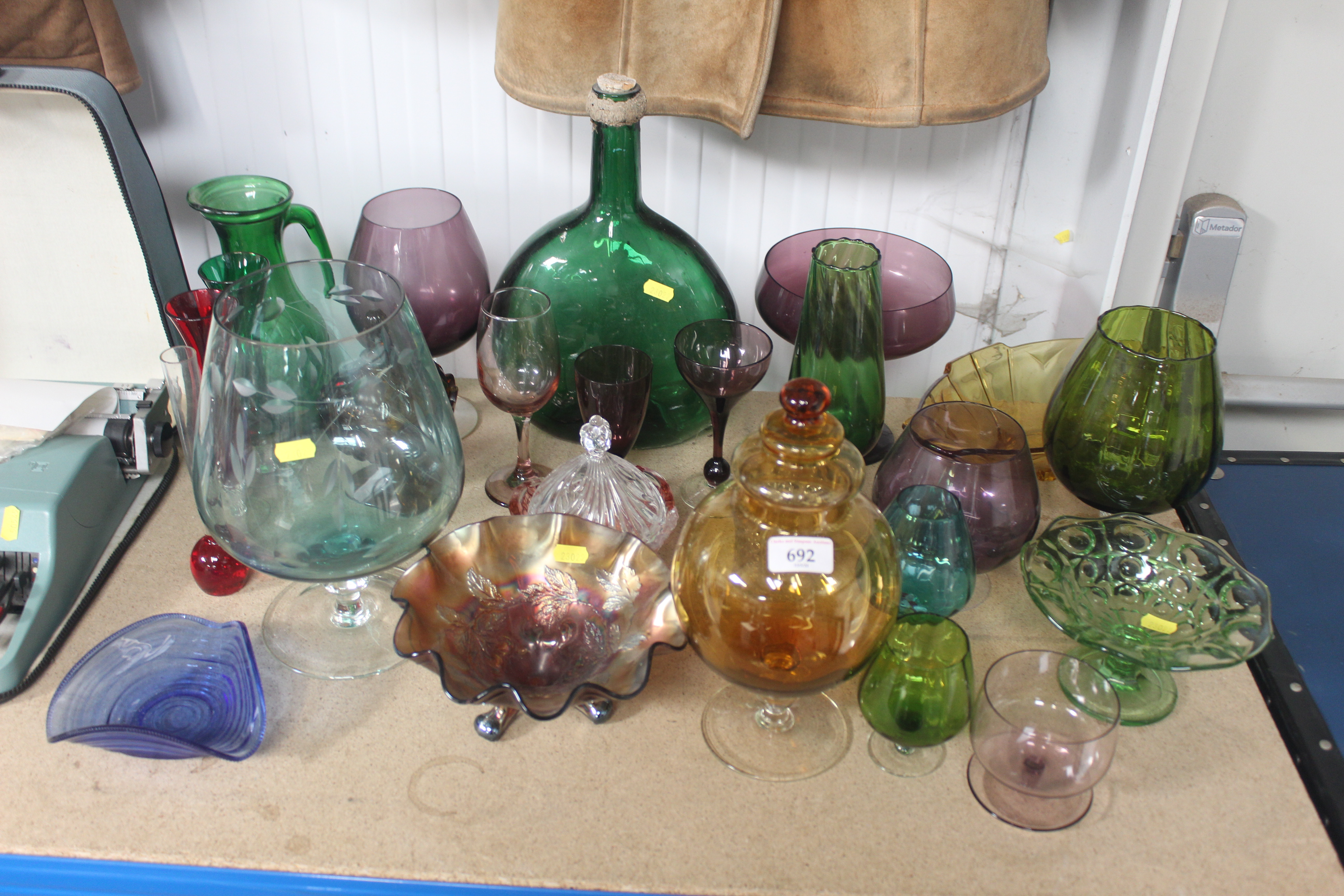 A collection of various coloured glassware to incl