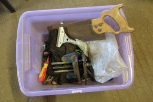 A box of various hand tools and bench vice etc