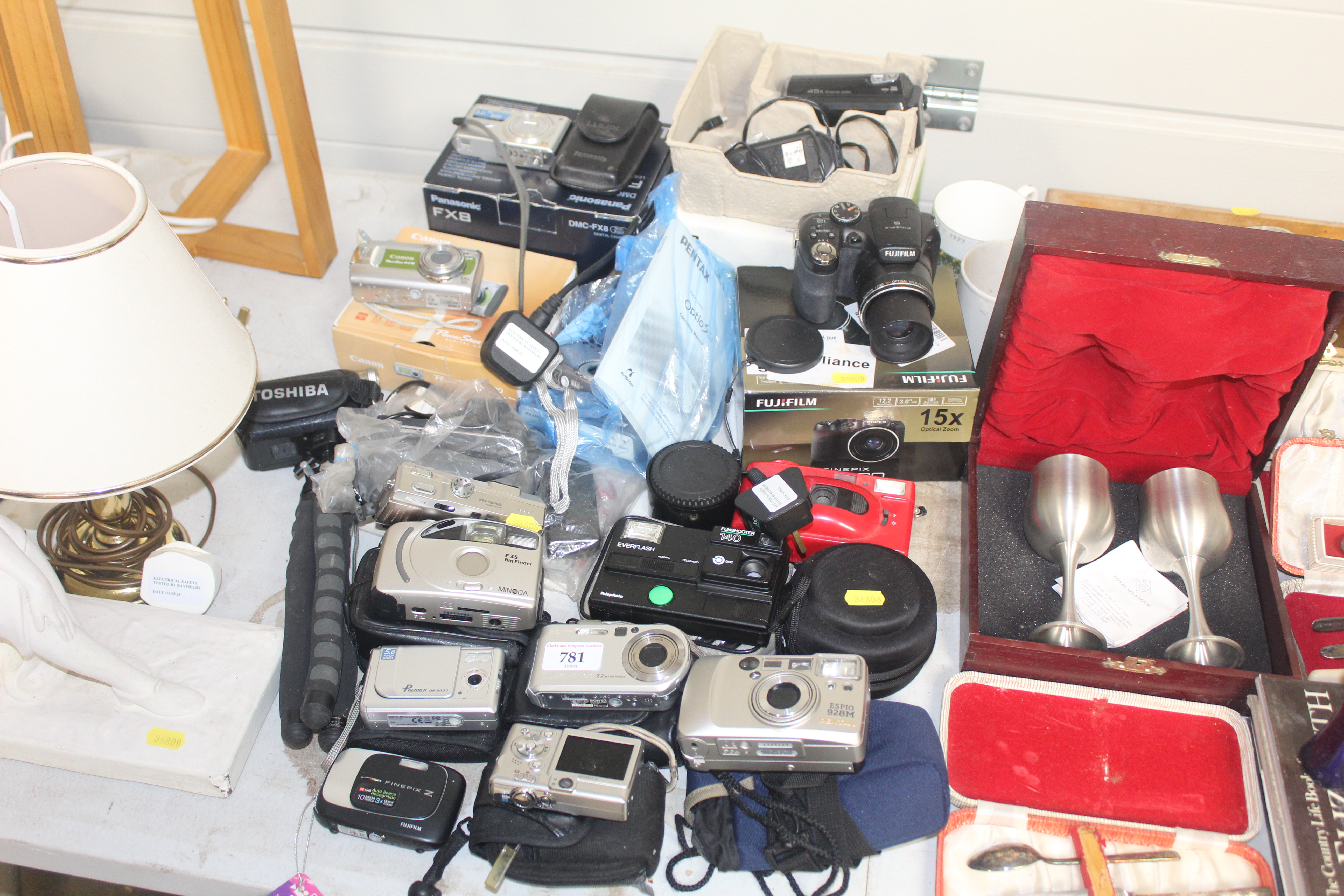 A collection of various cameras and accessories