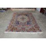 An approx. 9'5" x 6'3" patterned rug