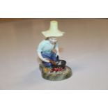 A Royal Doulton figure "River Boy" HN2128