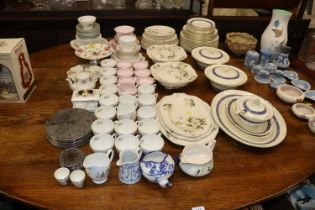 A large quantity of tea and dinnerware to include