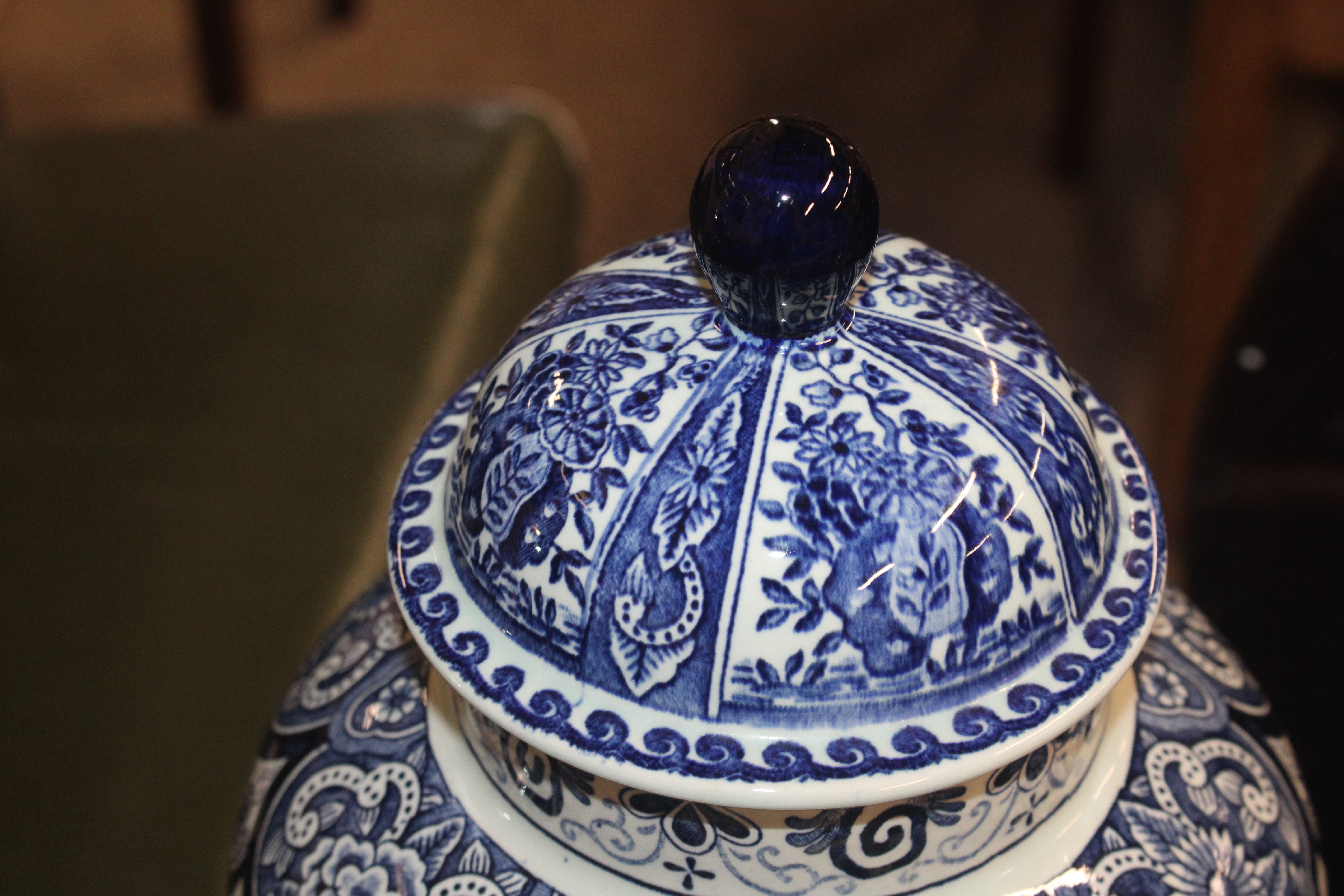 A Delft baluster vase and lid; a charger and three - Image 10 of 12