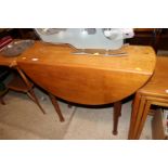 An oak drop leaf table