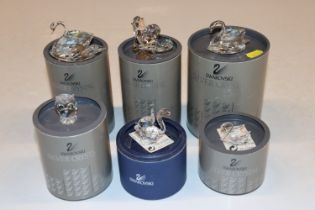 Six Swarovski ornaments with boxes