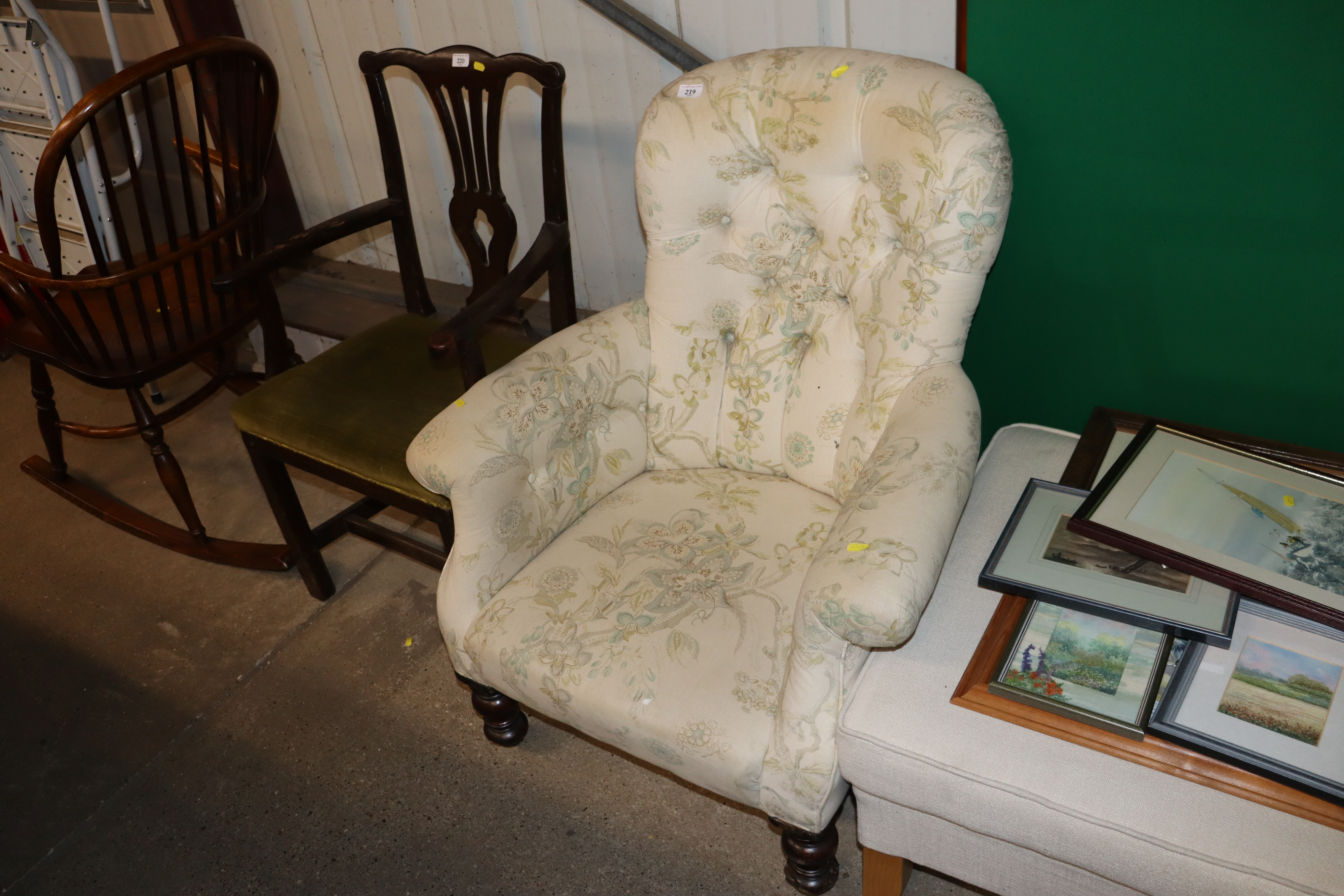 A Victorian button down upholstered armchair