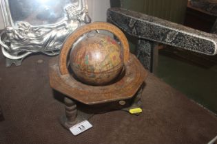 An early 20th Century table / desk globe on stand