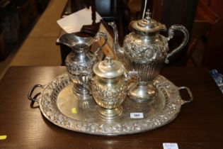 A silver plated tea tray, pot, jug, and vase and c