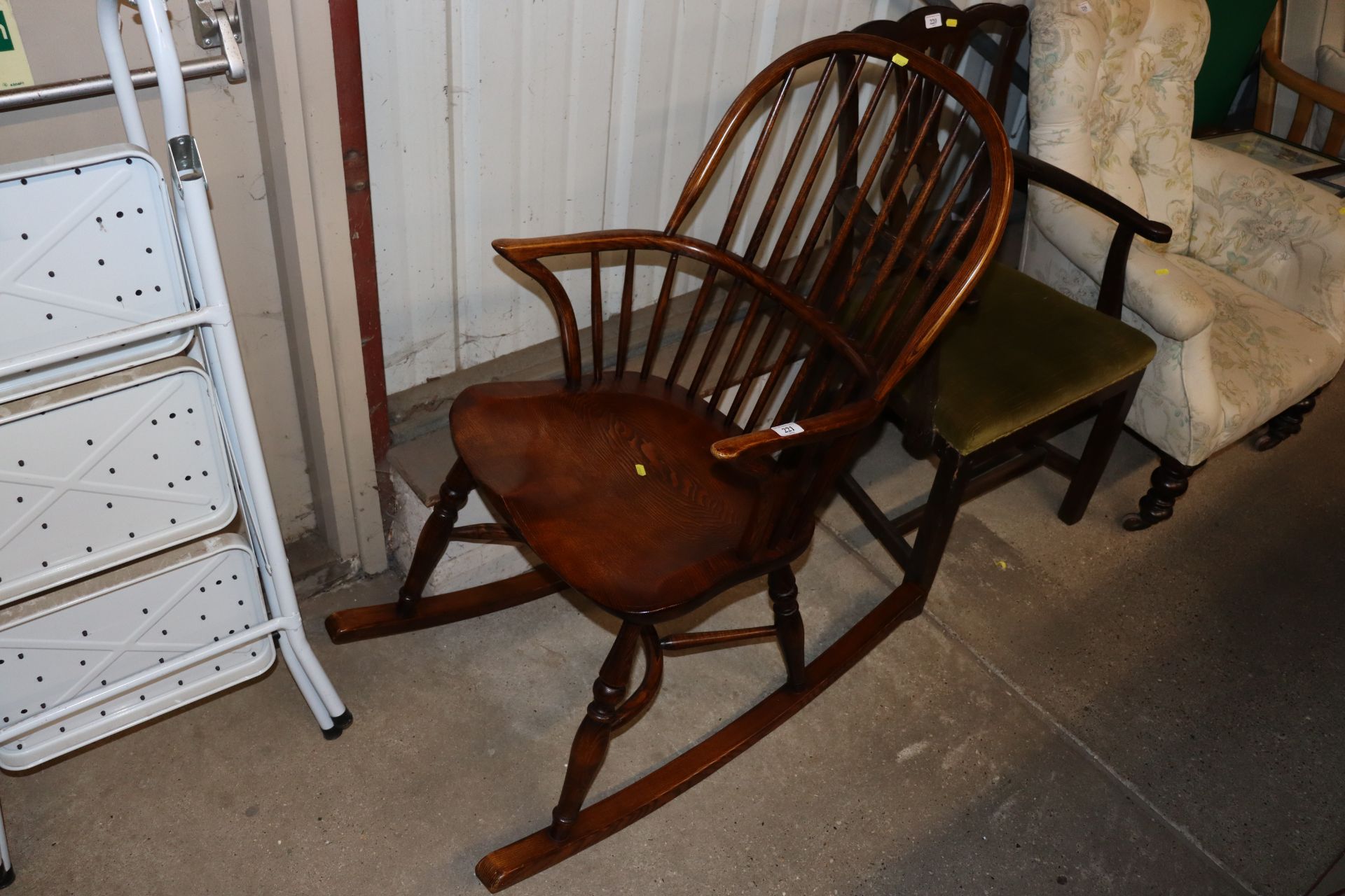 An elm seated Windsor rocking chair
