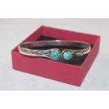 A 925 silver and turquoise set bangle