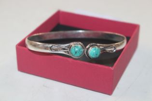 A 925 silver and turquoise set bangle