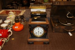 A Victorian slate mantel clock case; a gilt and ma