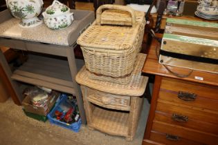 A wicker bedside table fitted single drawer; and a